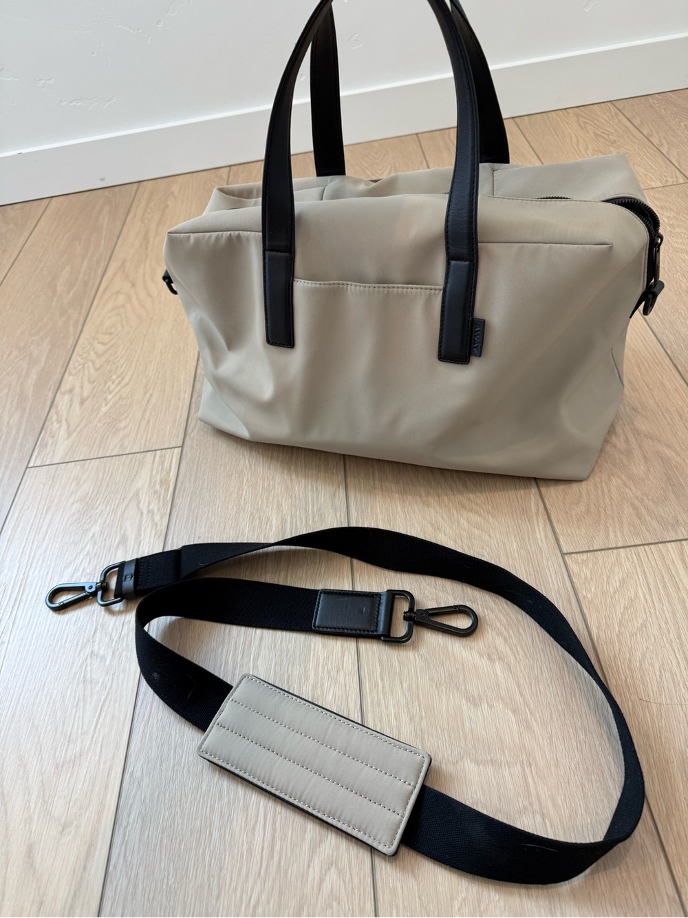 Away travel Beige duffle Bag with Black Straps